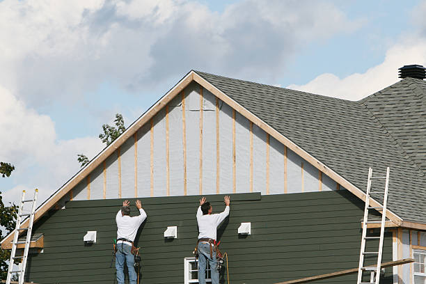Professional Siding technician working in Newtown, PA